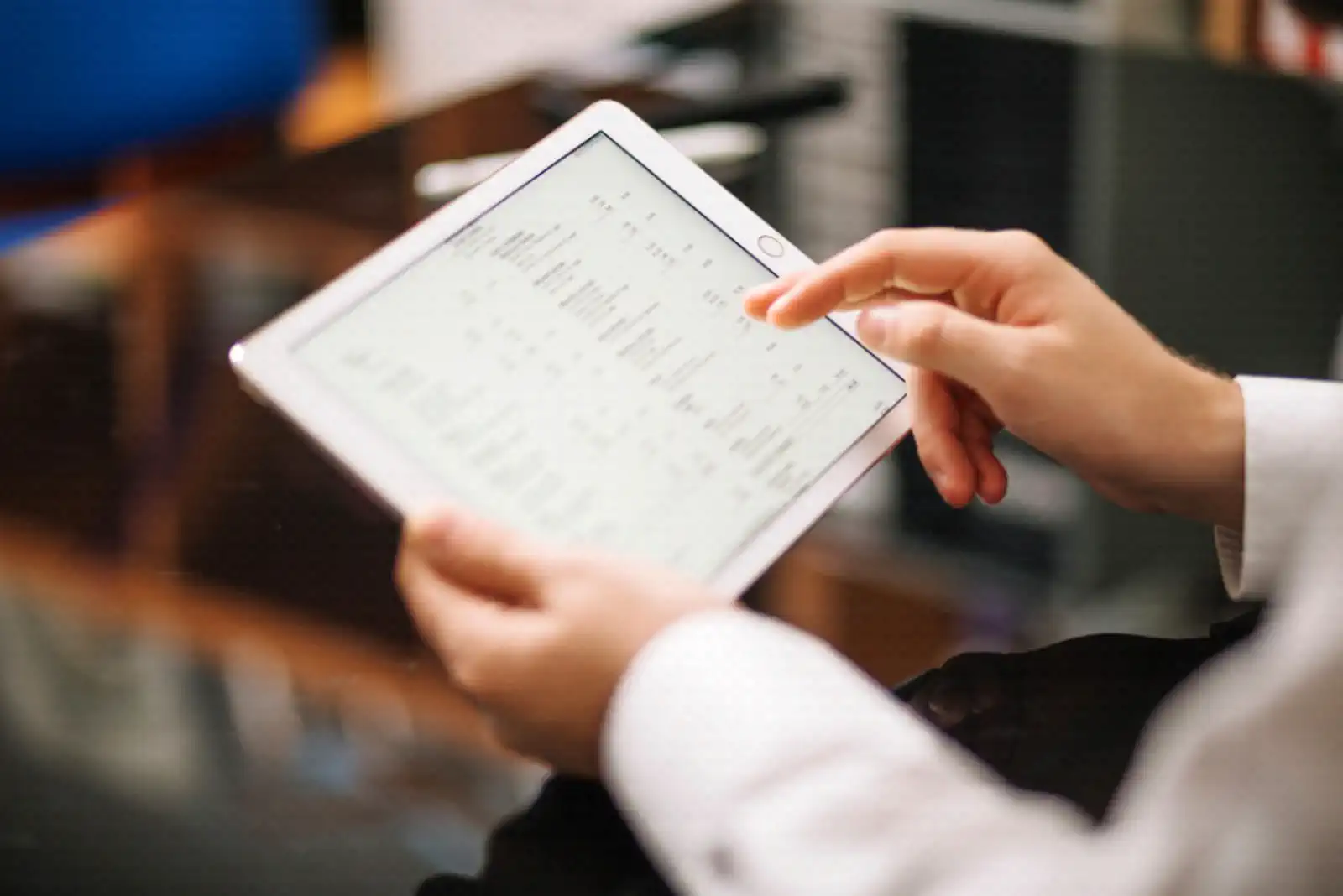Engineer reviewing materials data on a tablet